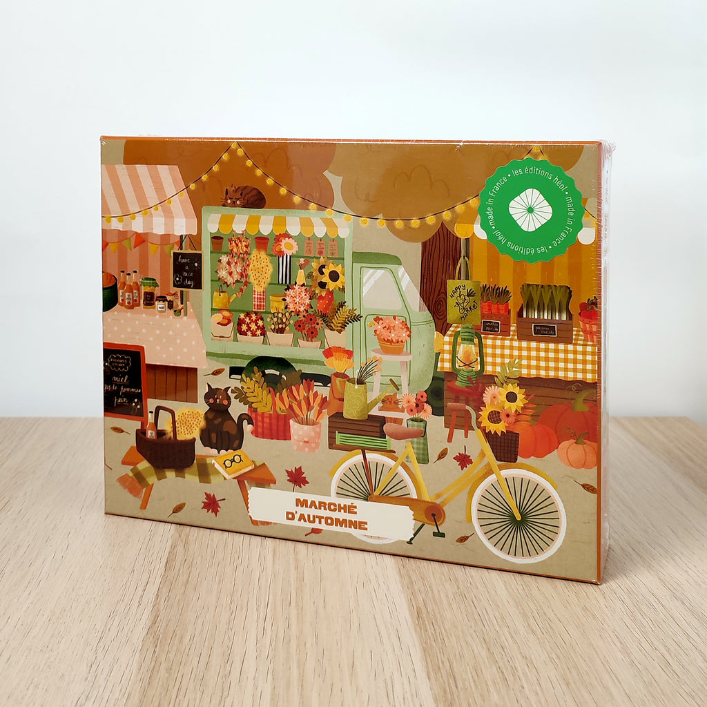 Puzzle Marché D’Automne, mercato autunnale illustrato con verdure di stagione, miele, fiori e gatti